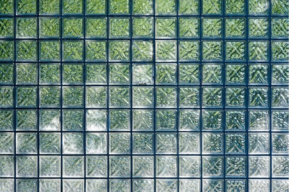 Glass block walls forming a translucent decorative wall, showcasing a popular 1980s home design trend.