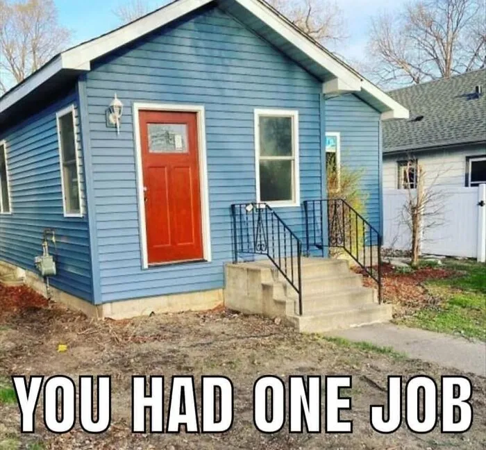 A small blue house with a front door elevated above ground and steps leading nowhere, showing uncultured ignorance.