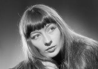 Black and white portrait of Juliette Gréco, the French singer known as the Little Sparrow, from the 1950s.