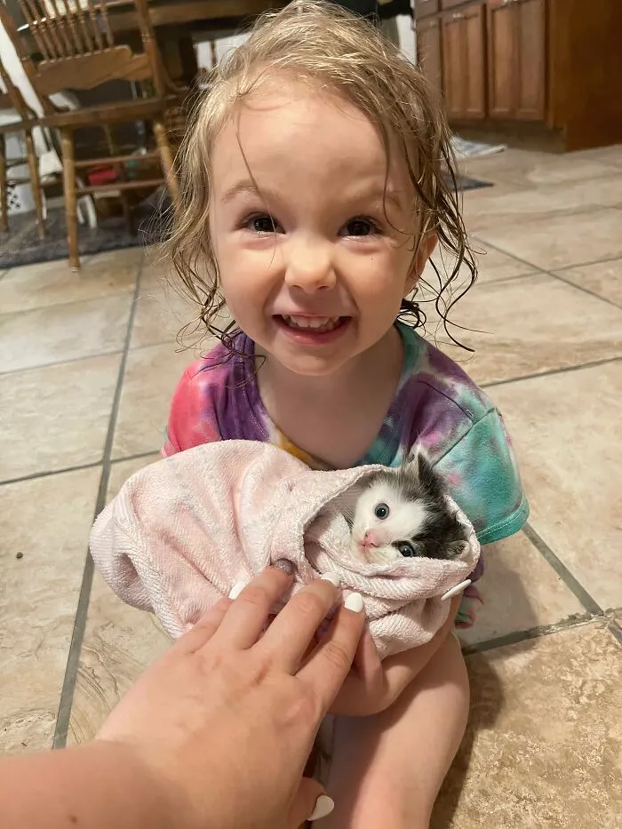 My Daughter And The Kitten We Saved In The Rain