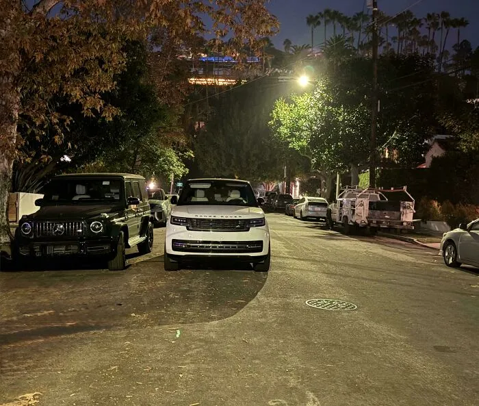 My Neighbor (Who Has A 2-Car Garage And A 2-Car Driveway) Insists On Double-Parking His Cars In The Street Instead, Blocking An Entire Lane Of The Road