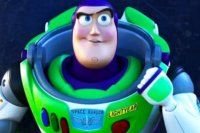 Buzz Lightyear in his space ranger suit with a focused expression in an animated scene.