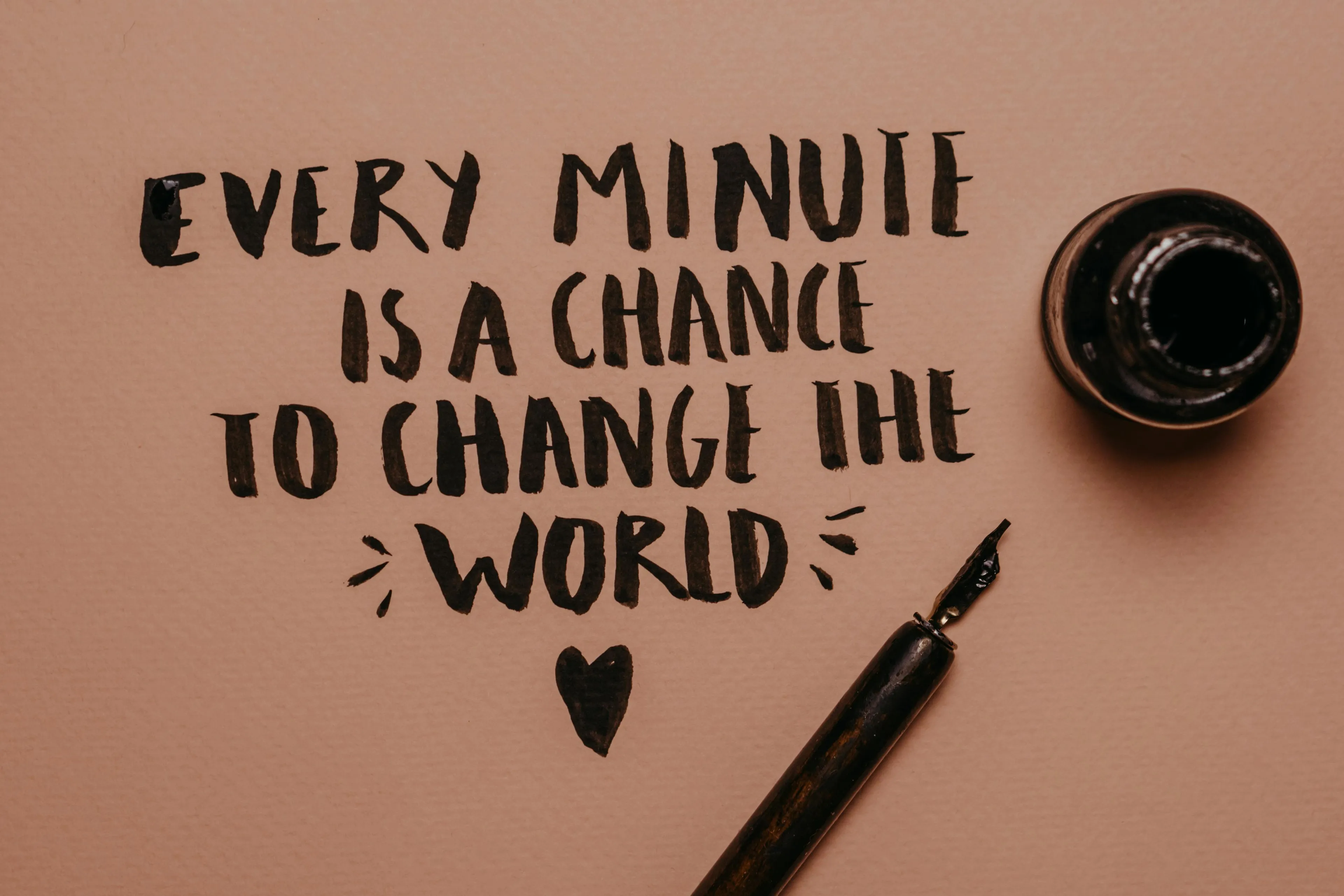 Handwritten quote on paper with ink and pen illustrating decision making style decoder for holiday postcard inspiration.