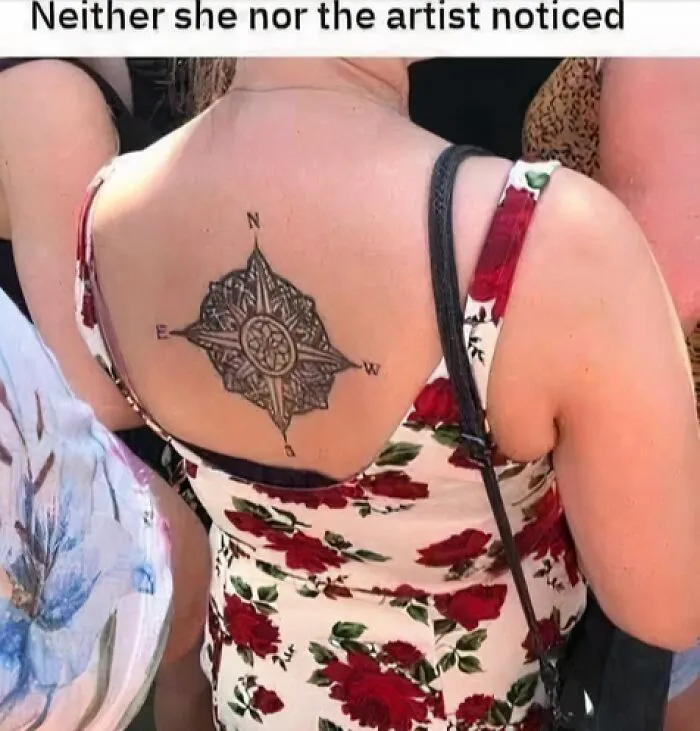 Woman with a floral dress showing a tattoo of a compass with incorrect cardinal directions, highlighting uncultured American ignorance.