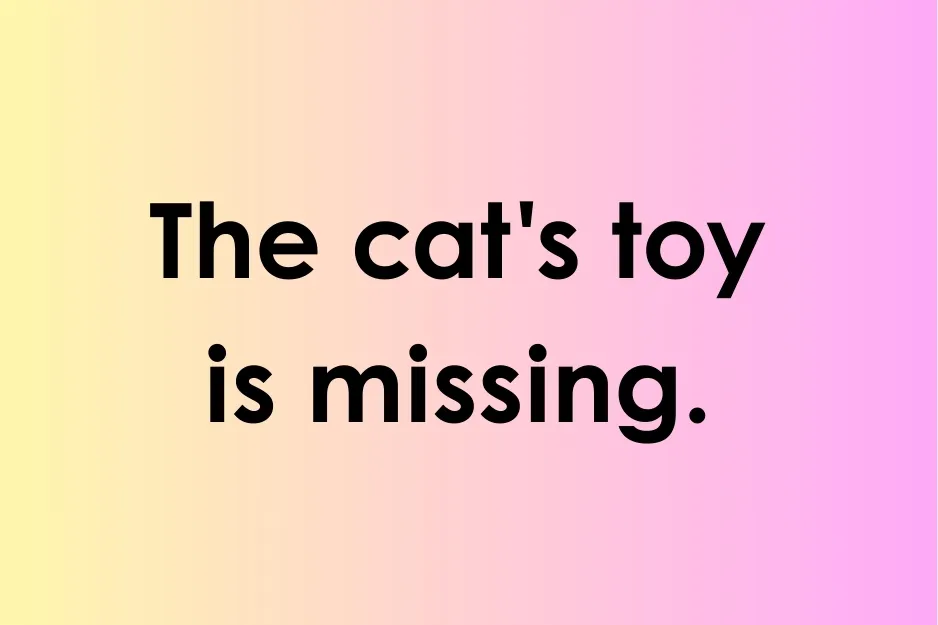 Sentence example showing the correct use of an apostrophe with cat's toy on a pastel gradient background.