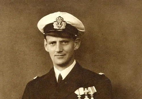 Portrait of King Frederik IX of Denmark in naval uniform with medals, related to the first widely televised royal coronation in 1953.