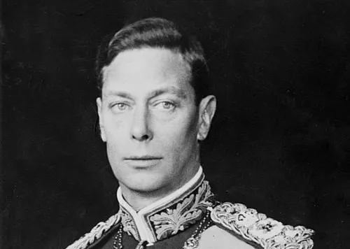 Black and white portrait of King George VI in formal military uniform, symbolizing the first widely televised royal coronation.