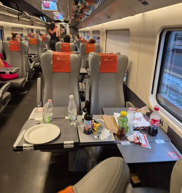 Family With Two Young Kids On The Train, One Playing Loudly On Her iPad While The Other Younger One Was Screaming, They Left This