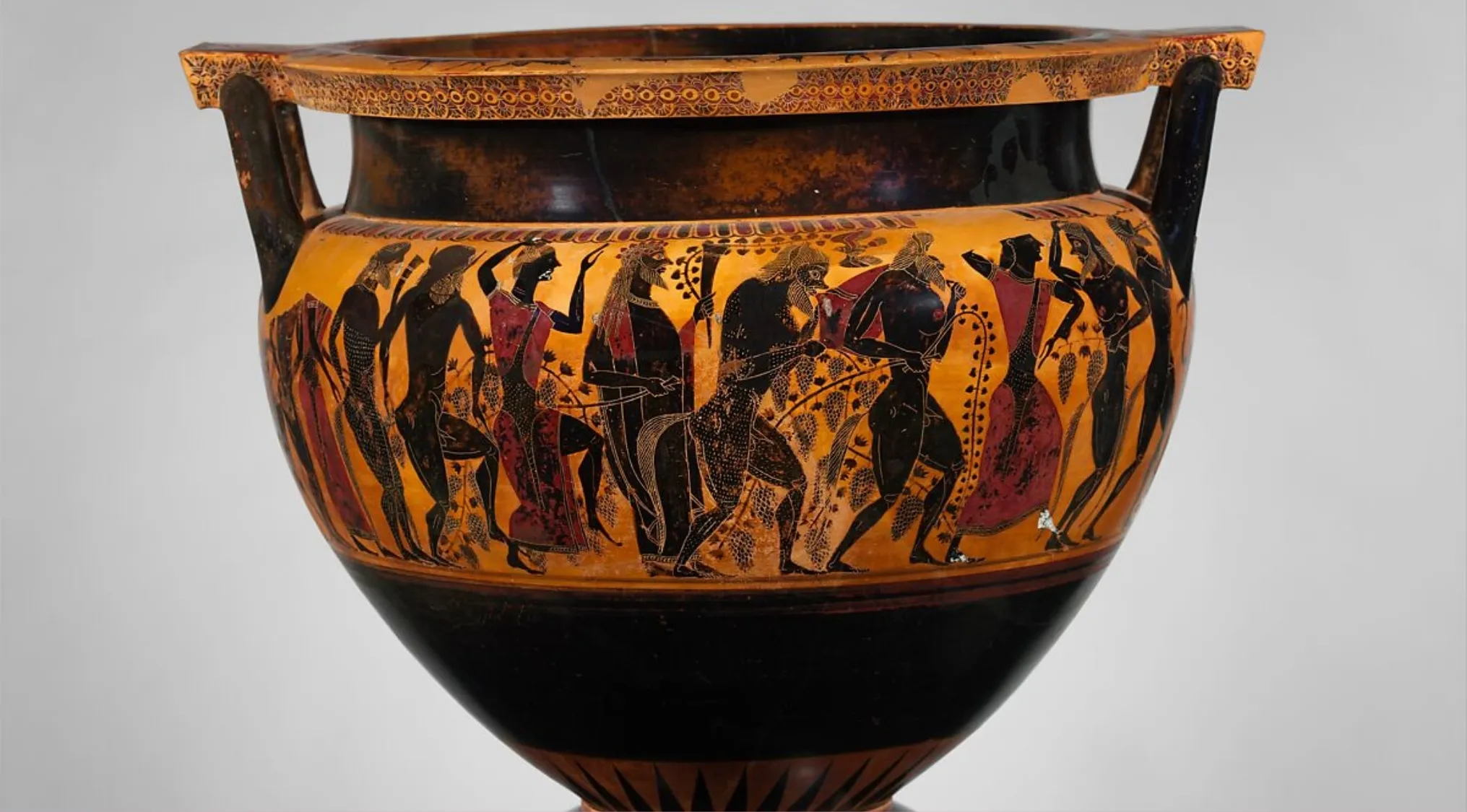 Ancient Greek pottery krater with black-figure decoration depicting mythological figures in procession.