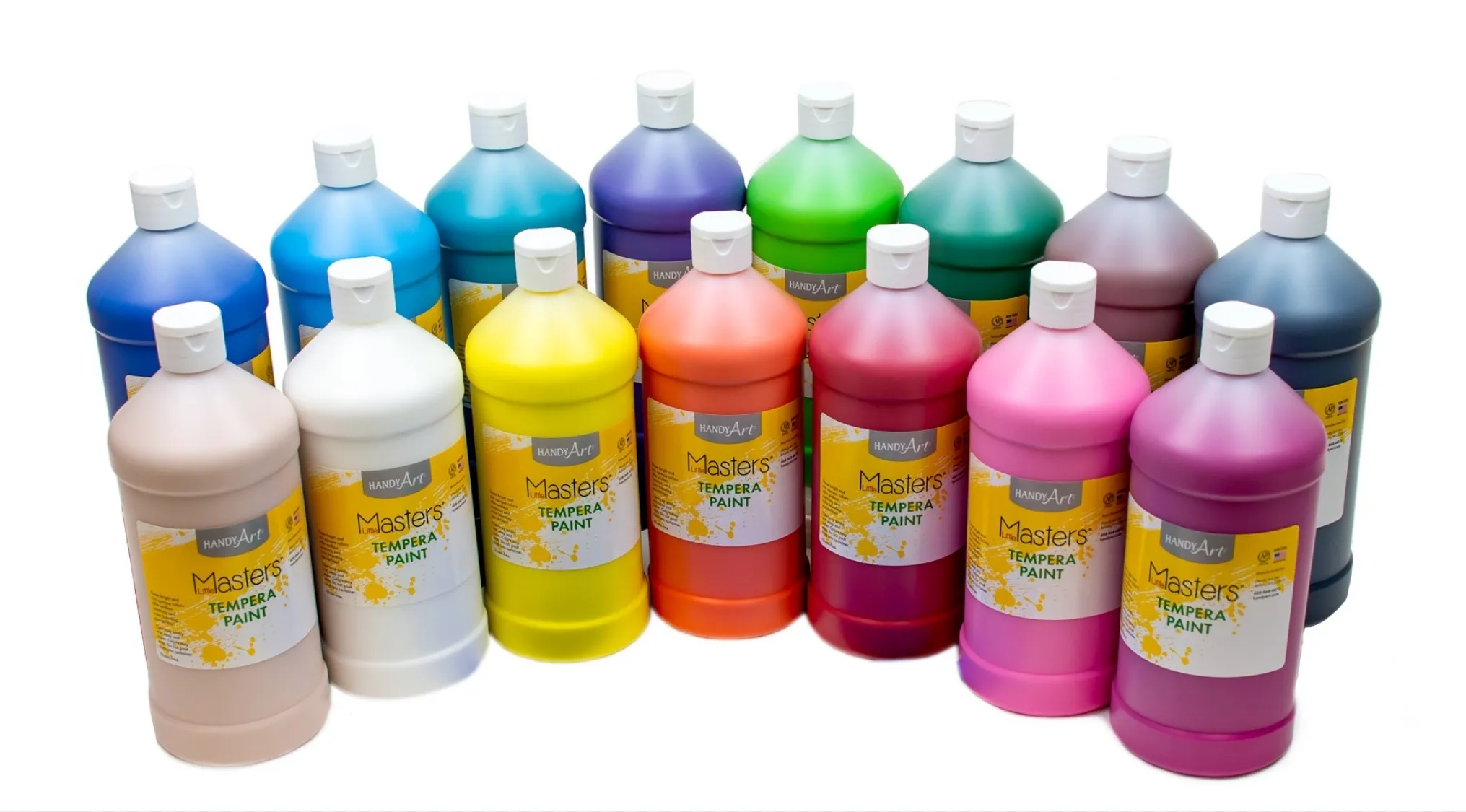 Bottles of colorful tempera paint arranged in rows on a white background showing art supplies.