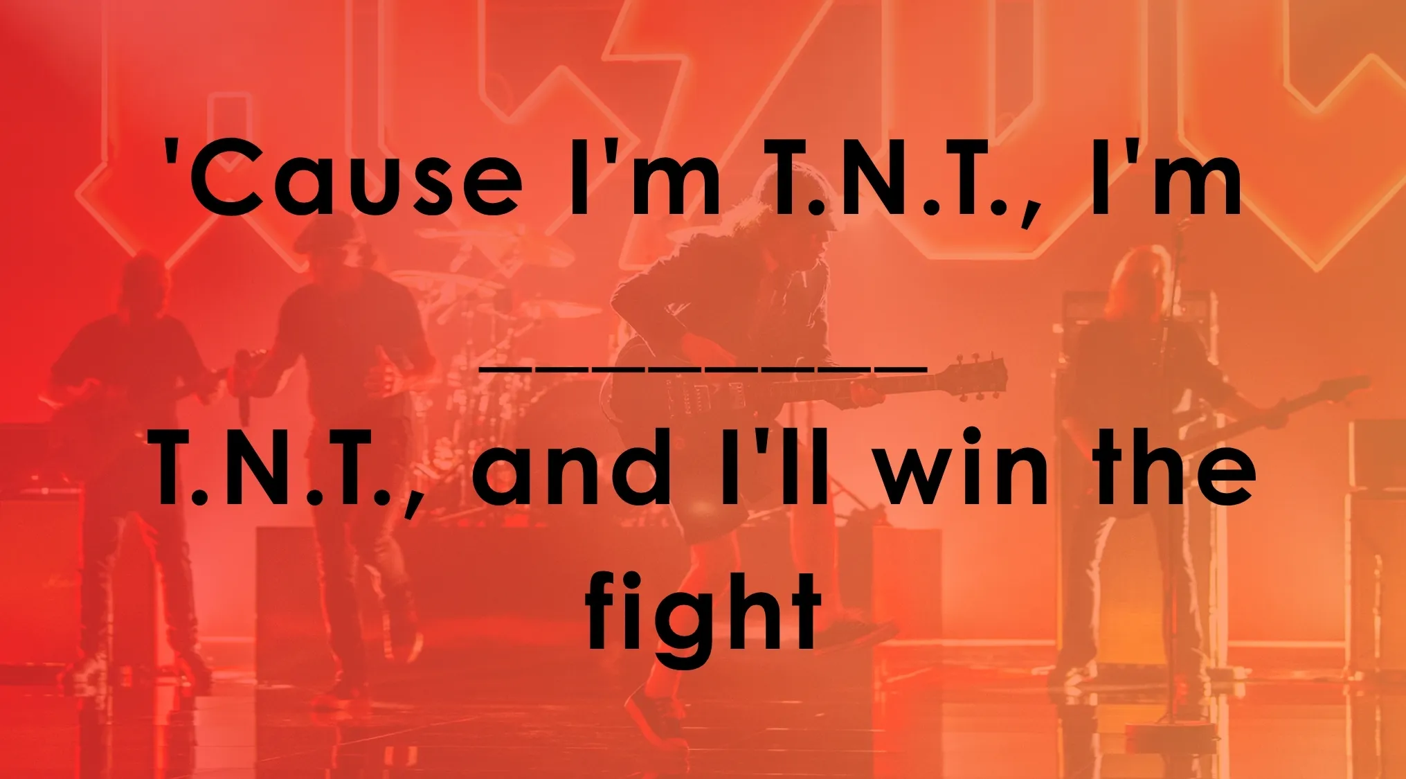 Rock band performing on stage with red lighting and lyrics challenge about finishing T.N.T. song lyrics.