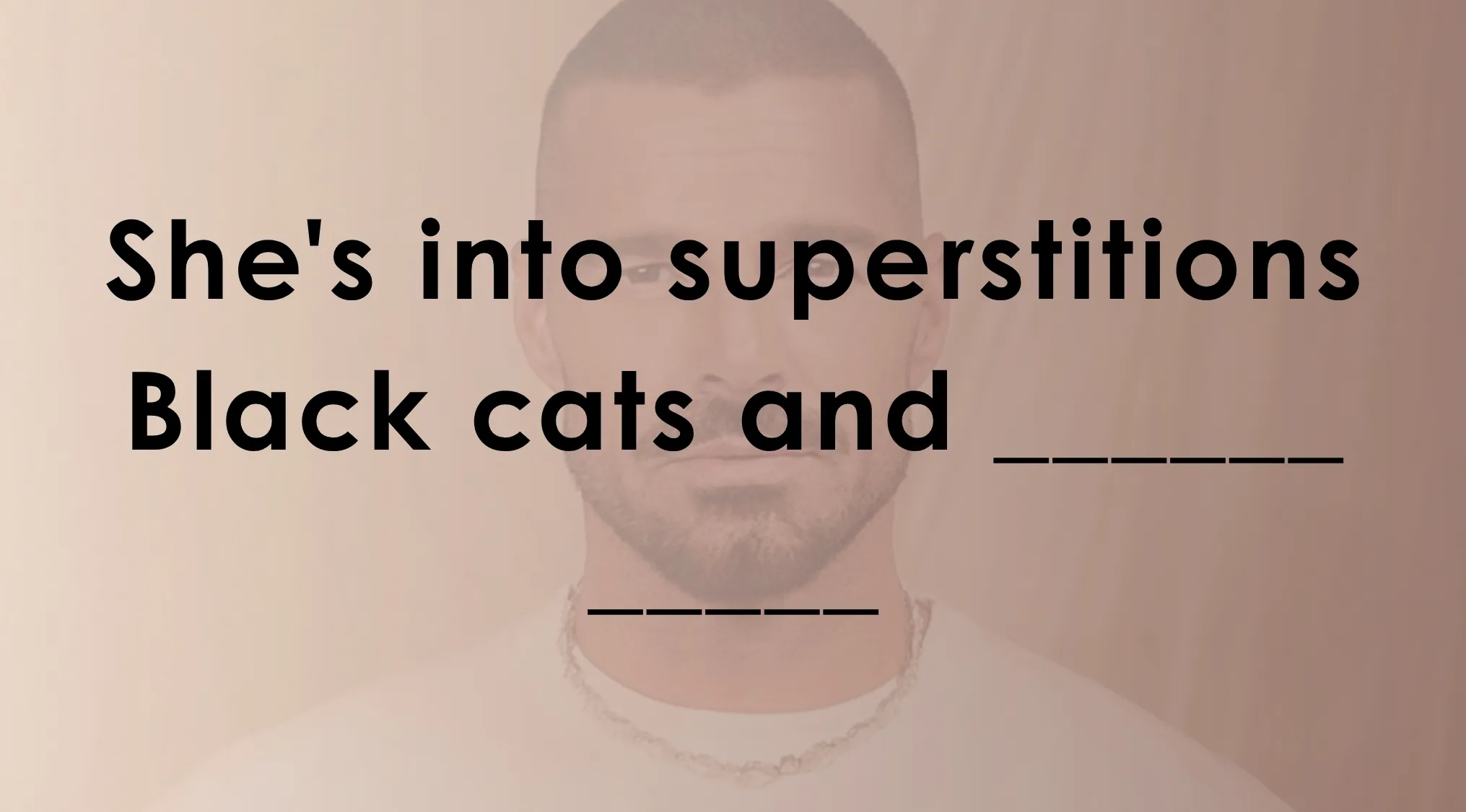 Man with shaved head and necklace with incomplete lyrics about superstitions and black cats for lyric quiz SEO.