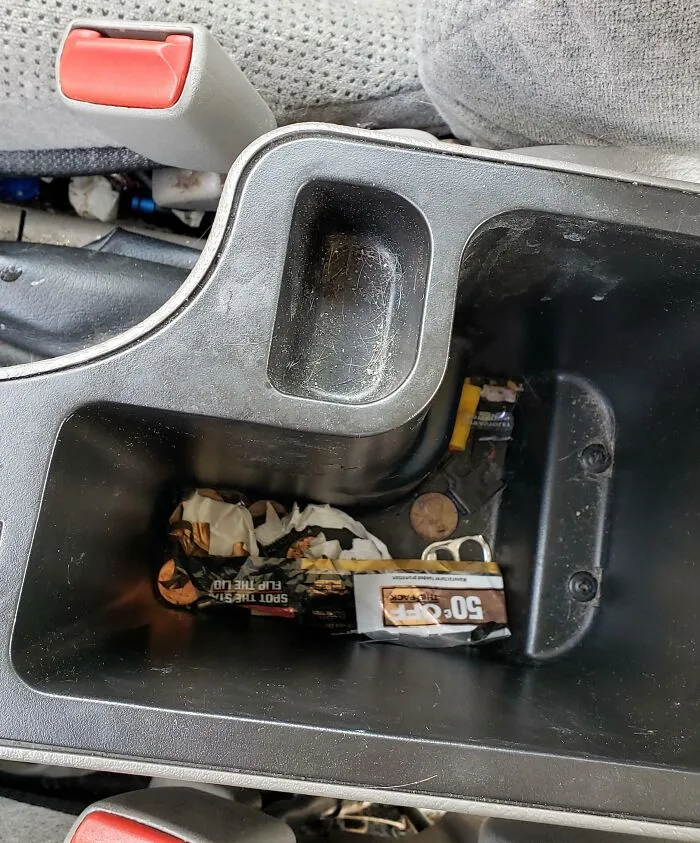 How My Sister Uses My Center Console While She Borrows My Car. I Had Kept Important Stuff In There