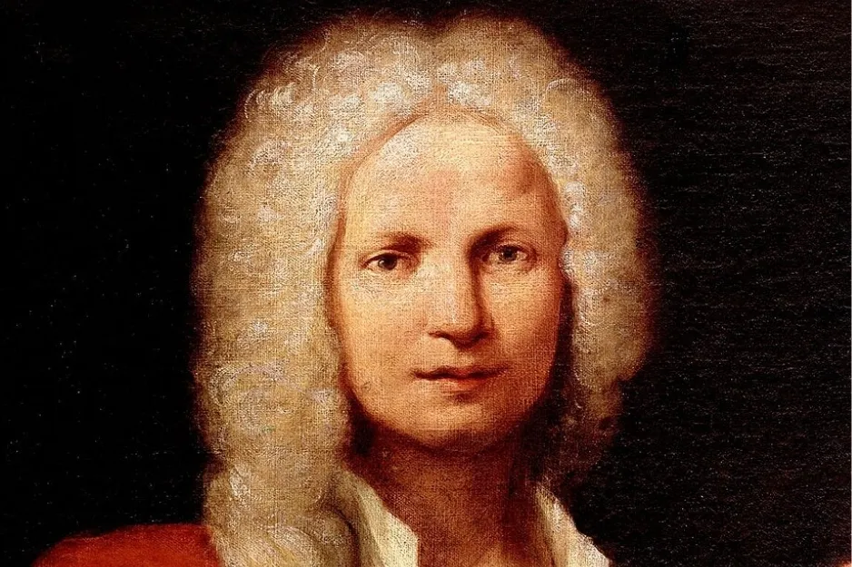 Portrait of composer Antonio Vivaldi with white curly hair and red clothing against dark background.