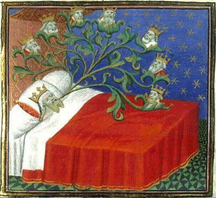 Medieval art creature with crowned human heads growing from a vine, shown bending over a red tablecloth.