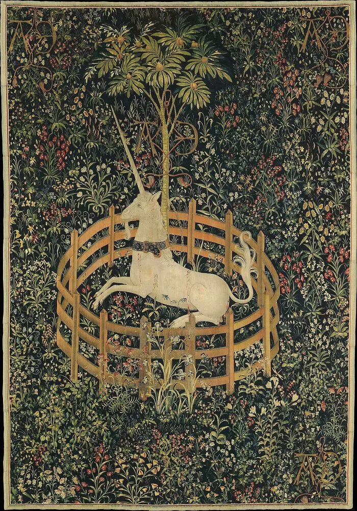 Medieval art tapestry showing a white unicorn in a fenced garden surrounded by detailed plants and flowers, bizarre creatures theme.