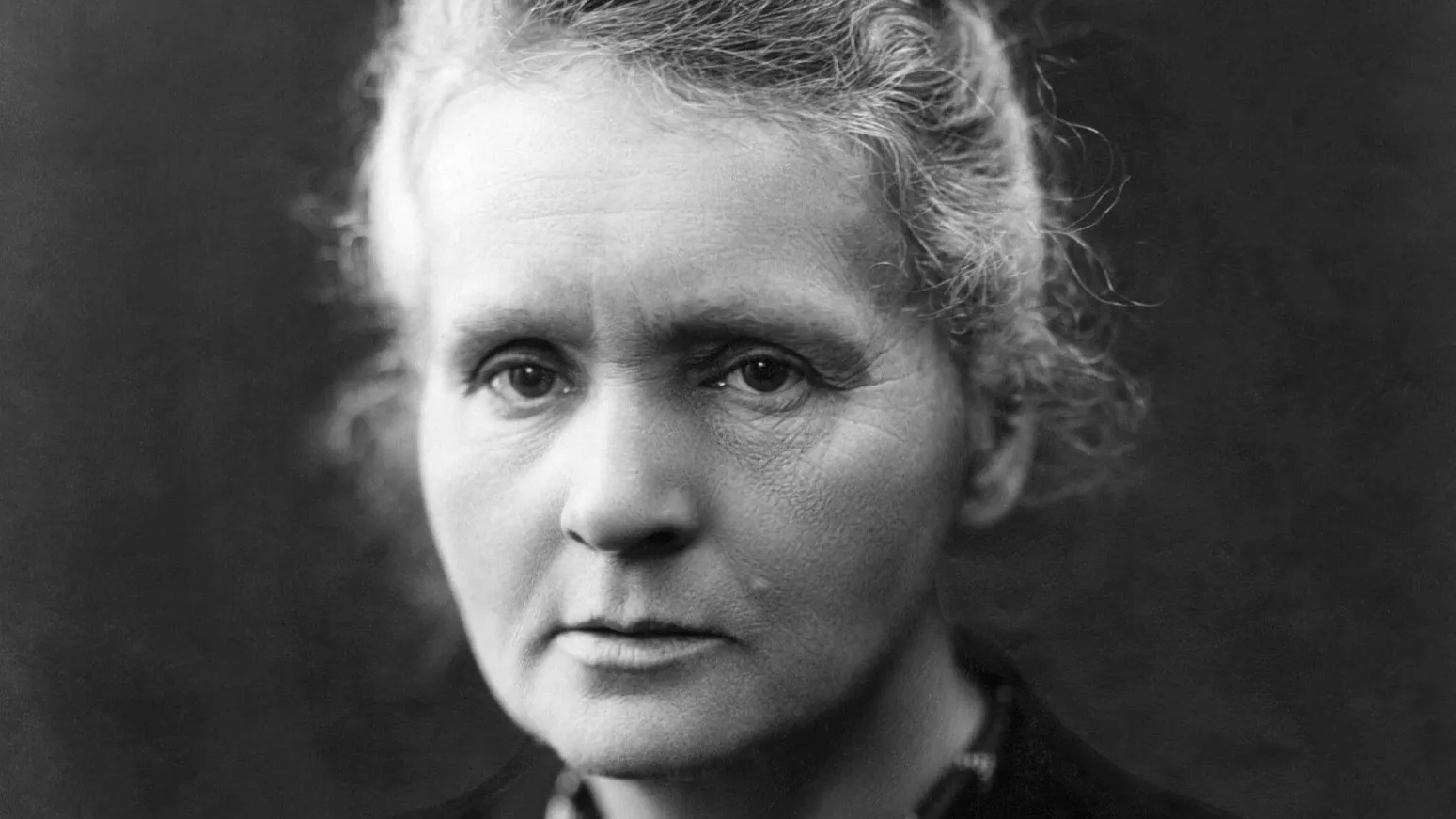 Black and white portrait of the first woman Nobel Prize winner, highlighting countries that were first in history quiz topic.