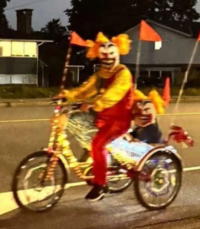 This Man And His Child Are Riding Around In My Town At Night In Canada