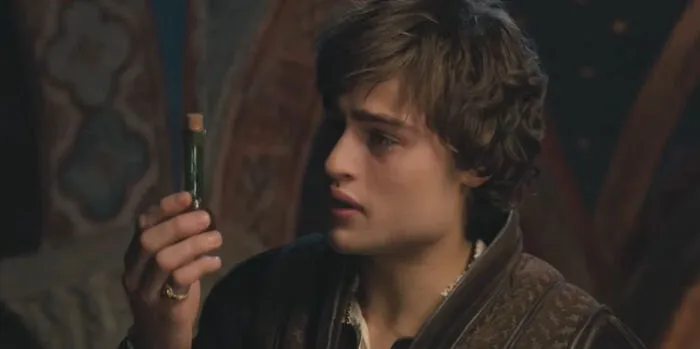 In Romeo and Juliet, Romeo makes a hasty decision to drink poison when he finds his lover, Juliet, sleeping in a tomb, believing she’s gone. This decision leads to Juliet waking up and taking her own life as well. 