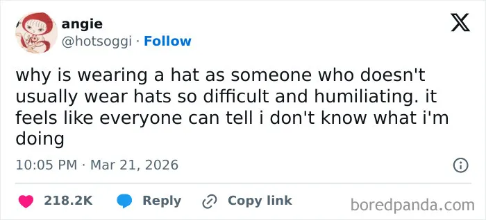 Screenshot of a funny tweet about the awkwardness of wearing a hat, highlighting humorous internet moments in the US.