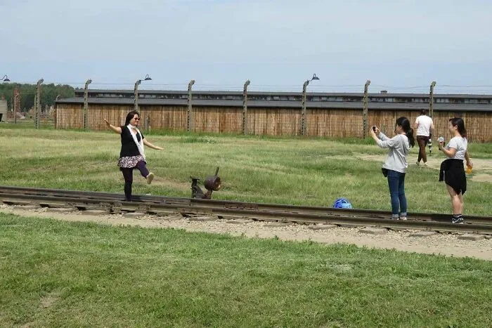 On Holocaust Memorial Day Let’s Remember To Teach The Next Generation To Respect Solemn Historical Sites And Not Every Photo Should Be A “Fun” Shot