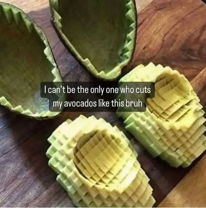 Avocados sliced in a unique crisscross pattern on a wooden board, appealing to food lovers and meme enthusiasts.