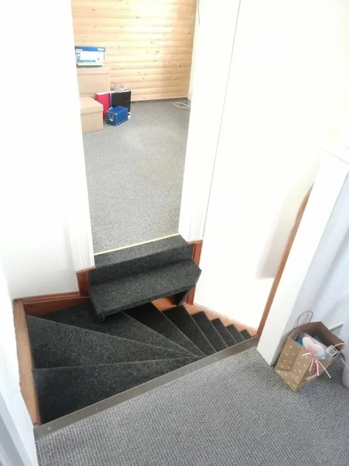 Descending staircase with an awkward step, illustrating uncultured and ignorant Americans' design fail humor.