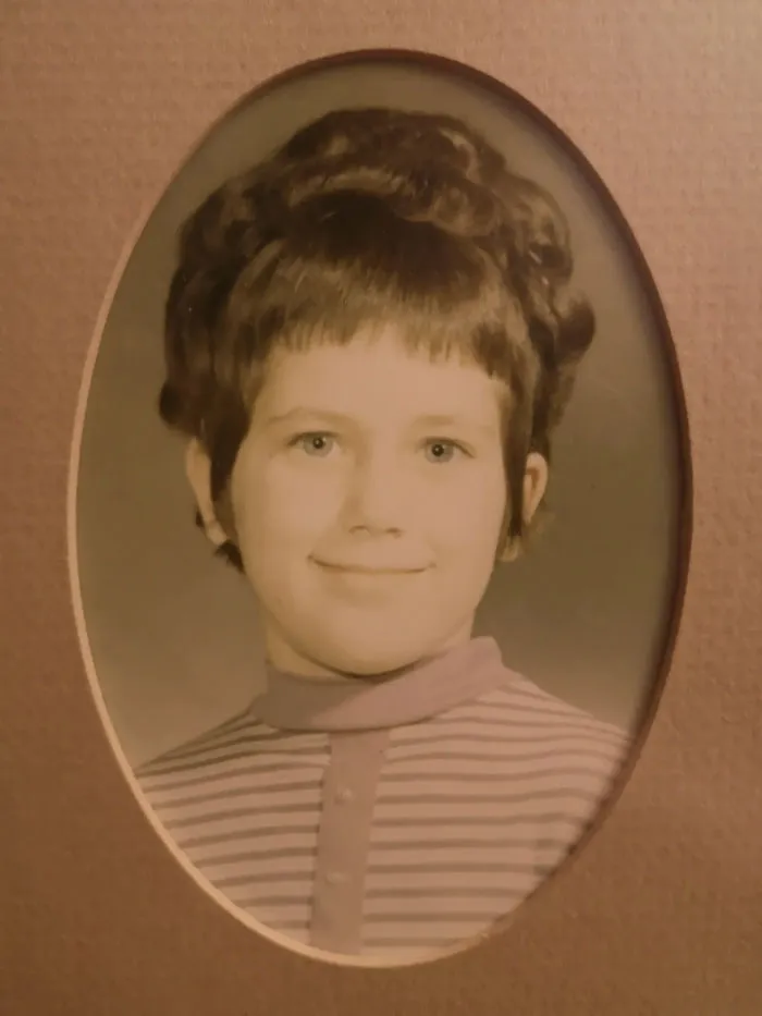 I Spent The Night Before Sleeping With Those Grey Prickly Curlers In My Hair, For My Grade 3 School Photo. I Look Like A 70s Real Estate Receptionist