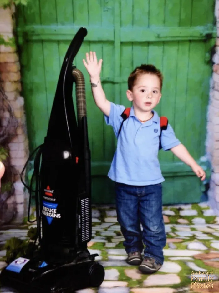 My Son Really Loves Vacuums. Reeeeeeeally Loves Them. On Preschool Picture Day, He Was So Miserable, And Was Offered The Preschool’s Vacuum Cleaner To Play With To Cheer Him Up Before His Photo. When I Picked Him Up, I Was Told That I “Might See A Bit Of The Vacuum In The Photo