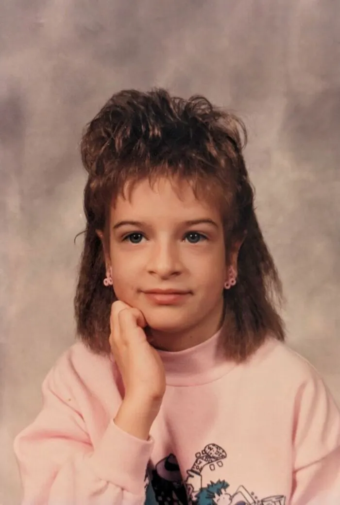 My Mother Was Studying To Be A Hairdresser In The 80s And I Was Her Victim Throughout My Class Photos