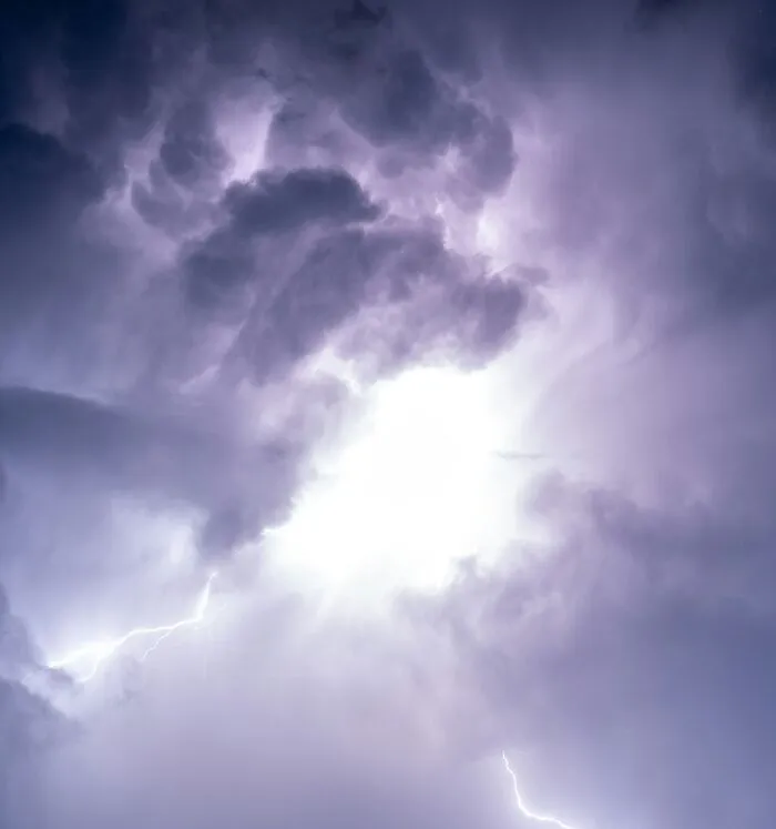 Lightning striking through dark clouds during a storm, representing proven facts that were once stories and speculations.