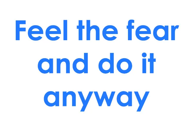 Blue bold text on a white background displaying the life motto feel the fear and do it anyway.