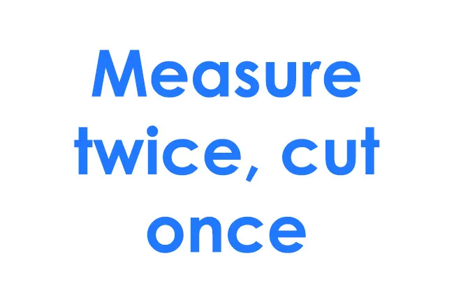 Measure twice cut once phrase in bold blue text on a white background emphasizing careful planning.