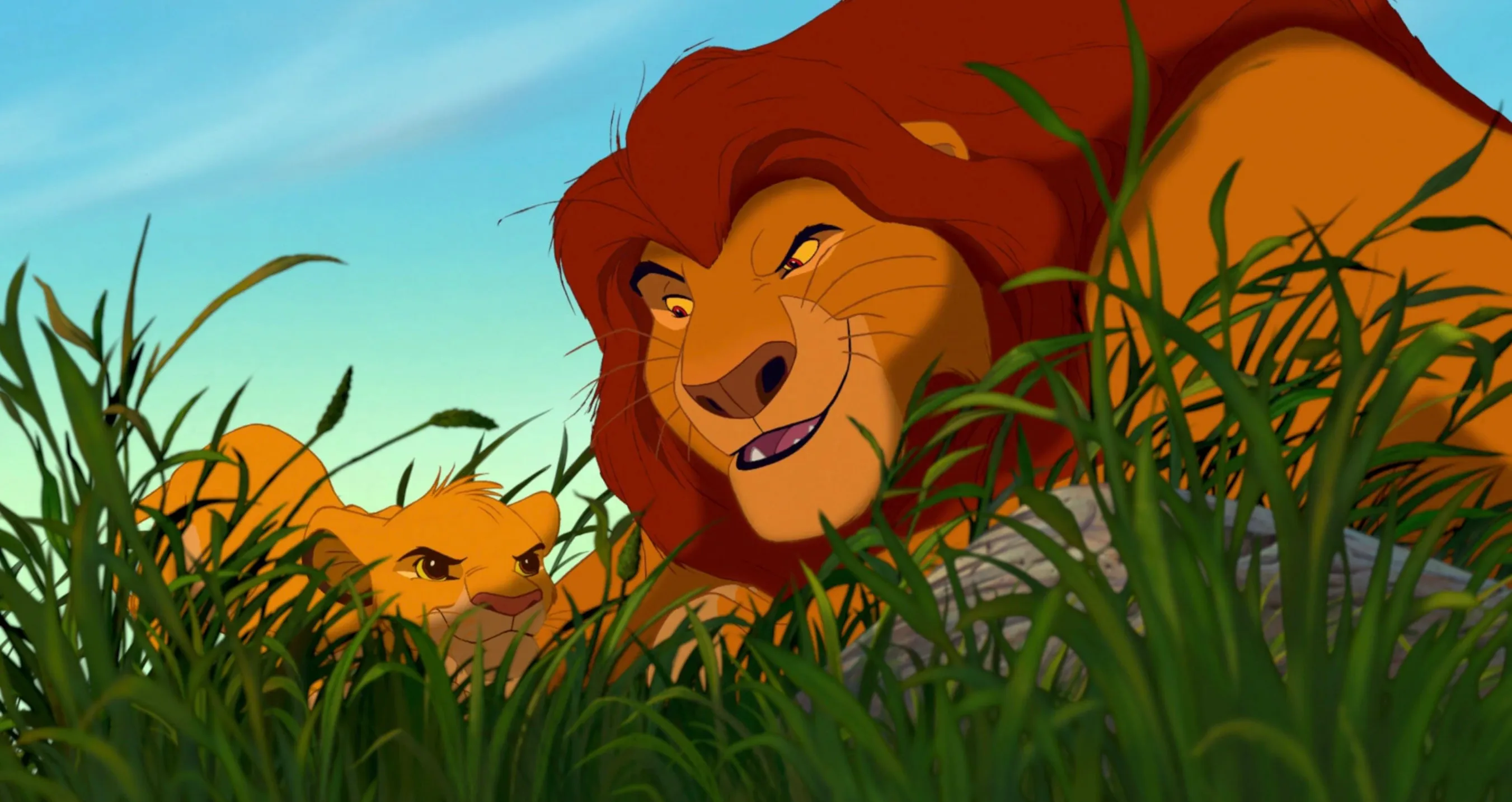Two lions from The Lion King lying in grass, illustrating a pub quiz question about Simba's father.