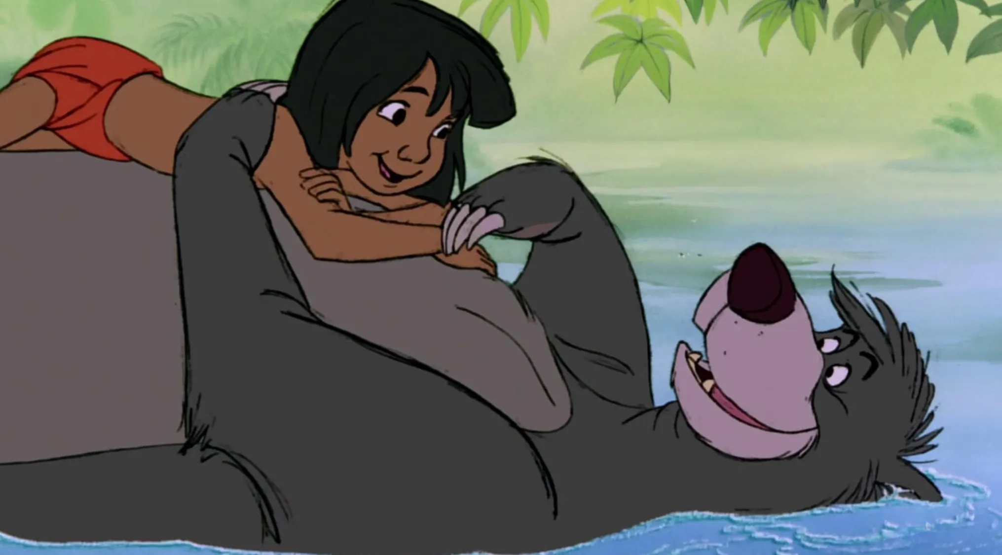 Animated scene from a 60s movie showing a boy lying on a bear floating in a river under green leaves.
