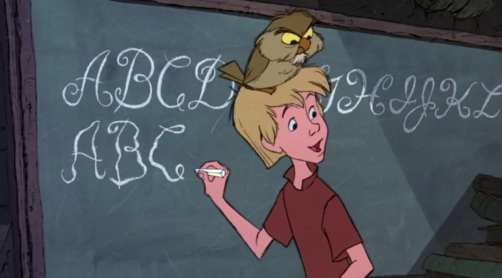 Animated 60s movie scene with a boy writing ABC on chalkboard and an owl perched on his head in a classroom setting.
