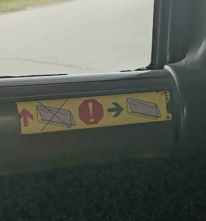I've Been Staring At This Sticker On The Bus For 8 Hours, And I Have No Idea What Is Trying To Say
