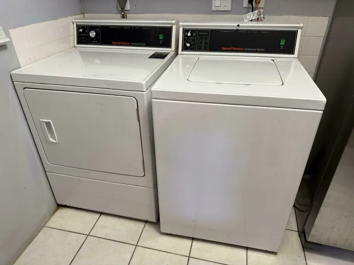 Classic white Speed Queen washer and dryer set, showing old products that refuse to give up.