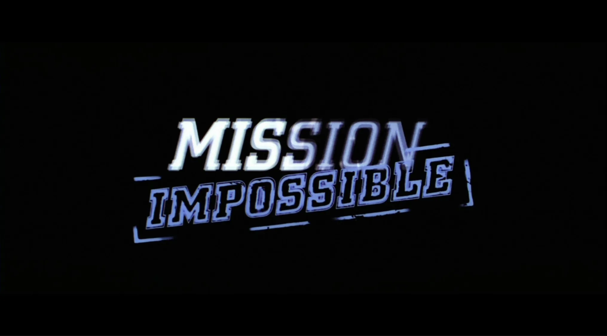 Mission Impossible logo with blurred white and blue text on a black background from the spy film series.