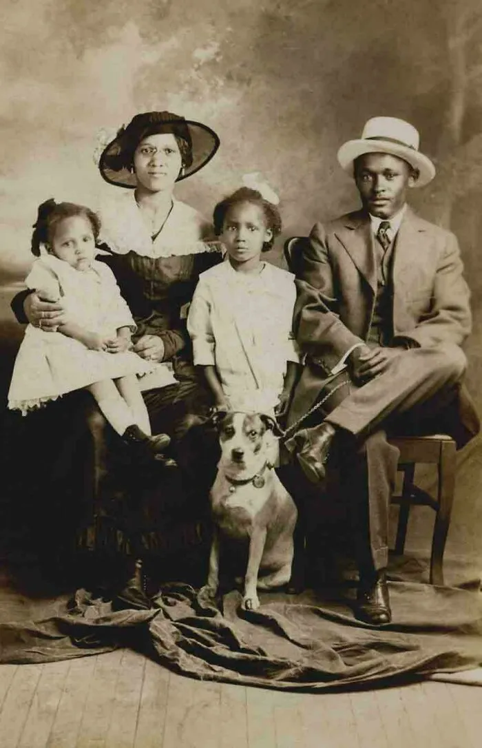 Family Posing With Their Dog, 1900s