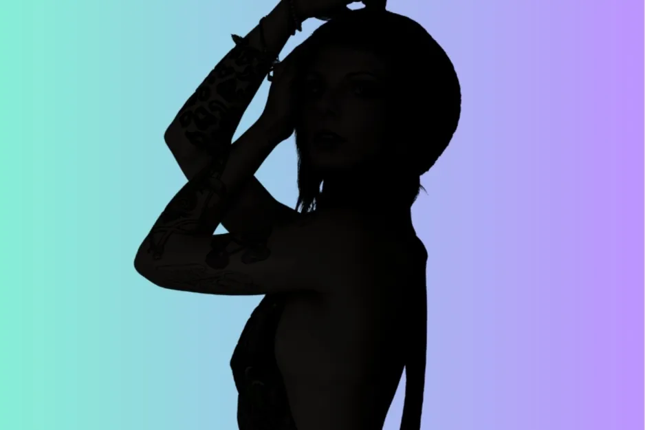 Silhouette of a person with tattoos wearing a hat against a blue to purple gradient background, representing Miranda Priestly.