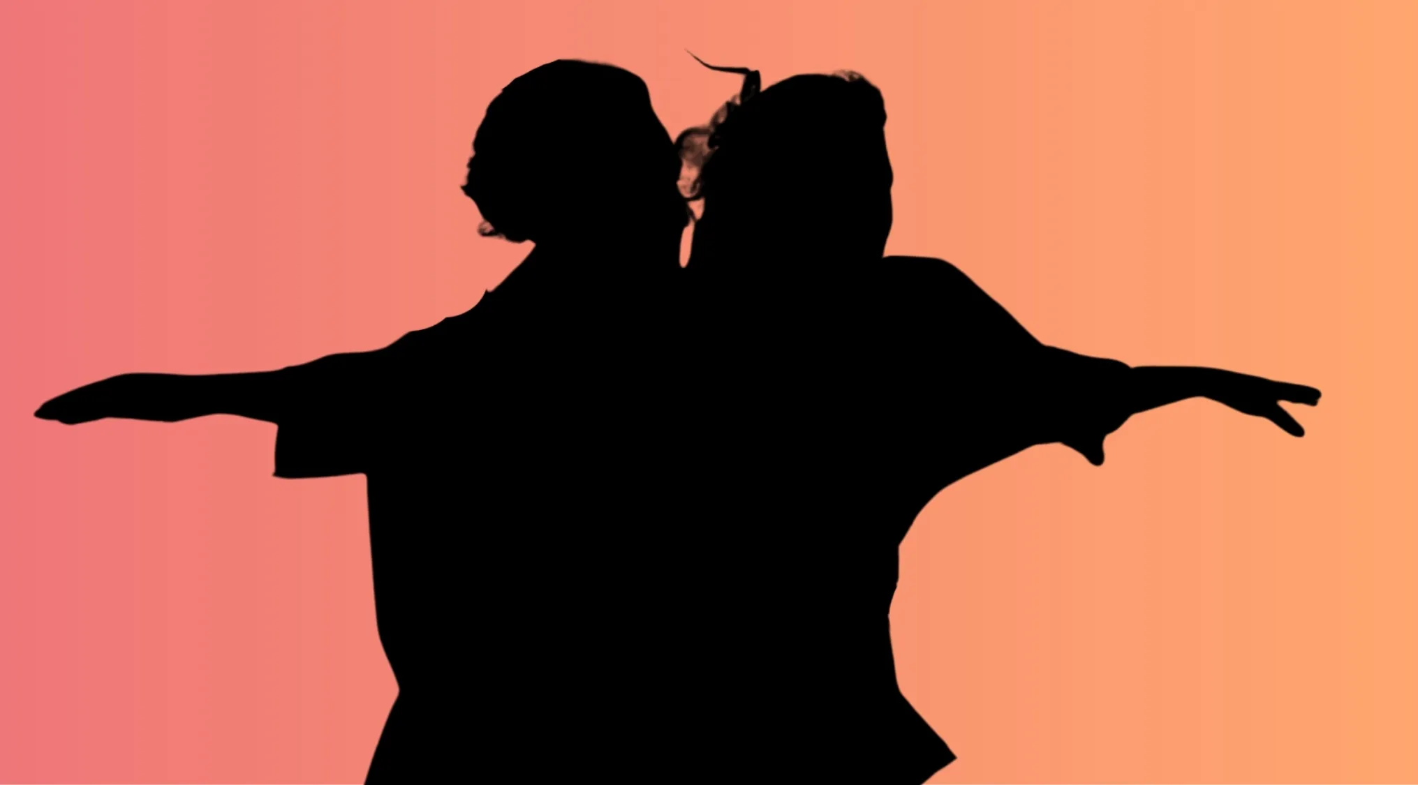 Silhouette of a couple standing back to back with arms extended against a gradient orange background for character quiz.