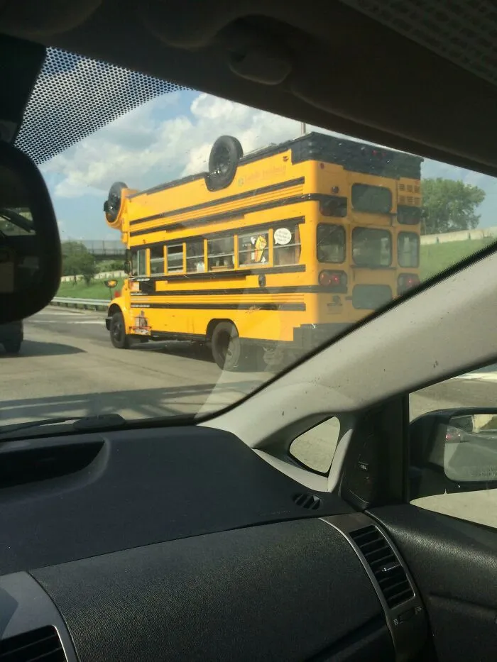 An Upside Down Bus On A Bus
