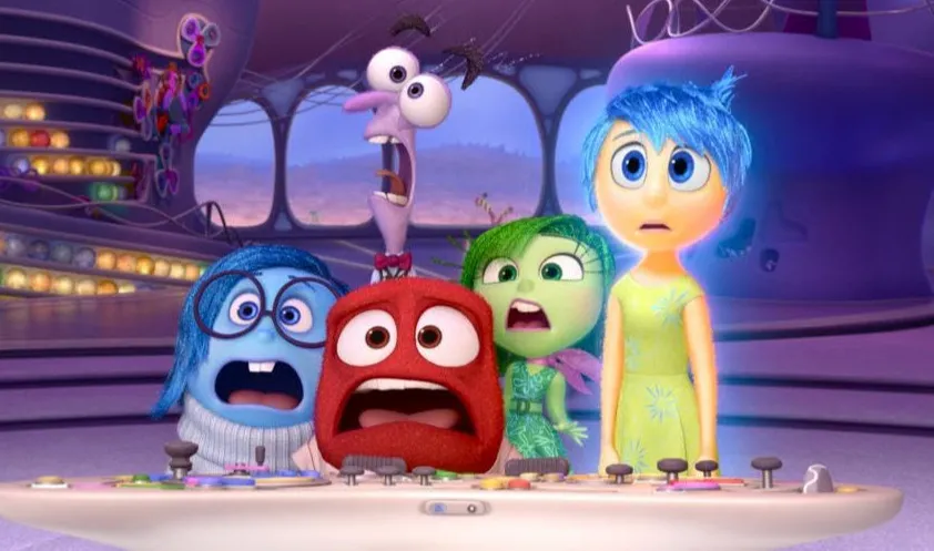 Animated characters from Inside Out show various emotions while looking at a control panel in a colorful, futuristic setting.