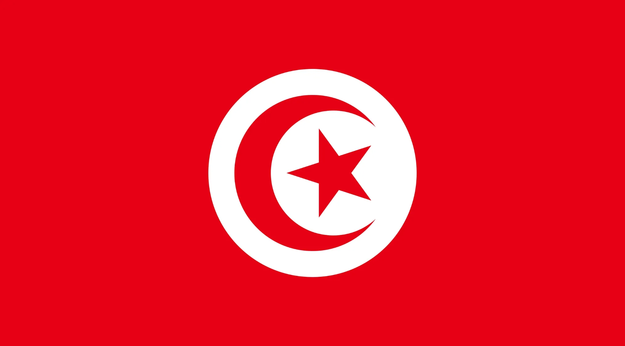 Red flag with white crescent and star, part of geography challenge to guess the country from world flags.