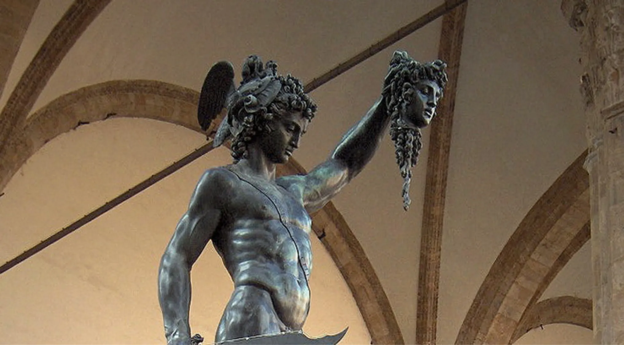 Bronze sculpture of Perseus holding the head of Medusa, displaying the dramatic style of the Mannerism art period.