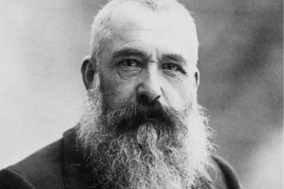 Portrait of Claude Monet with a full beard, closely associated with the Impressionism art period.