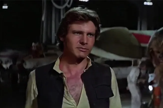 Han Solo from Star Wars saying may the Force be with you on the spaceship runway at night.