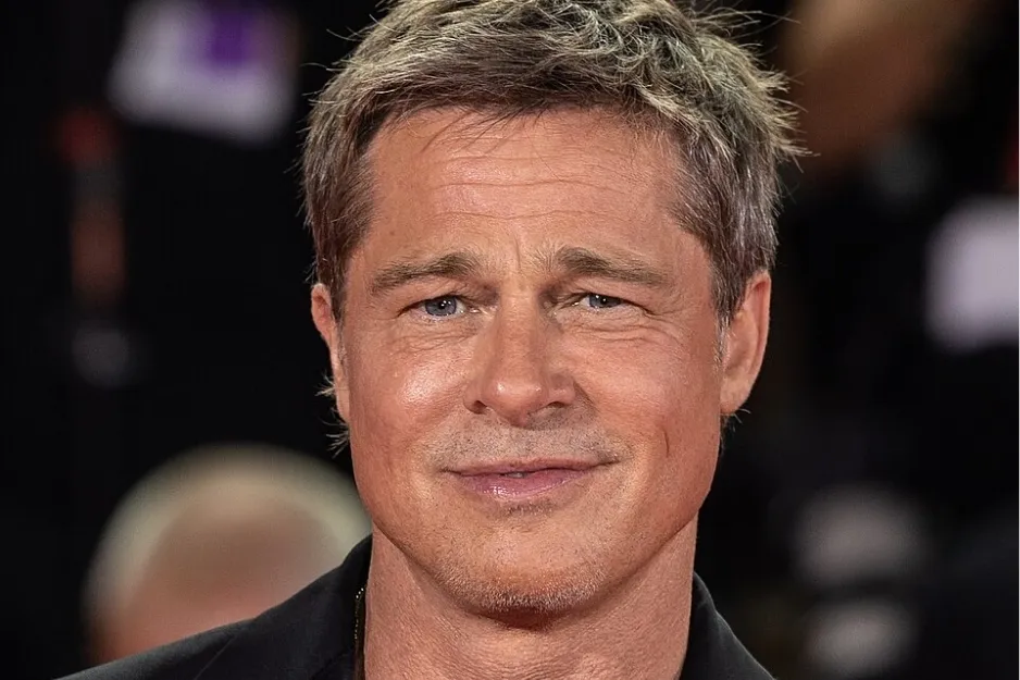 Brad Pitt close-up portrait at a red carpet event, not part of the cast of The Martian movie discussion.
