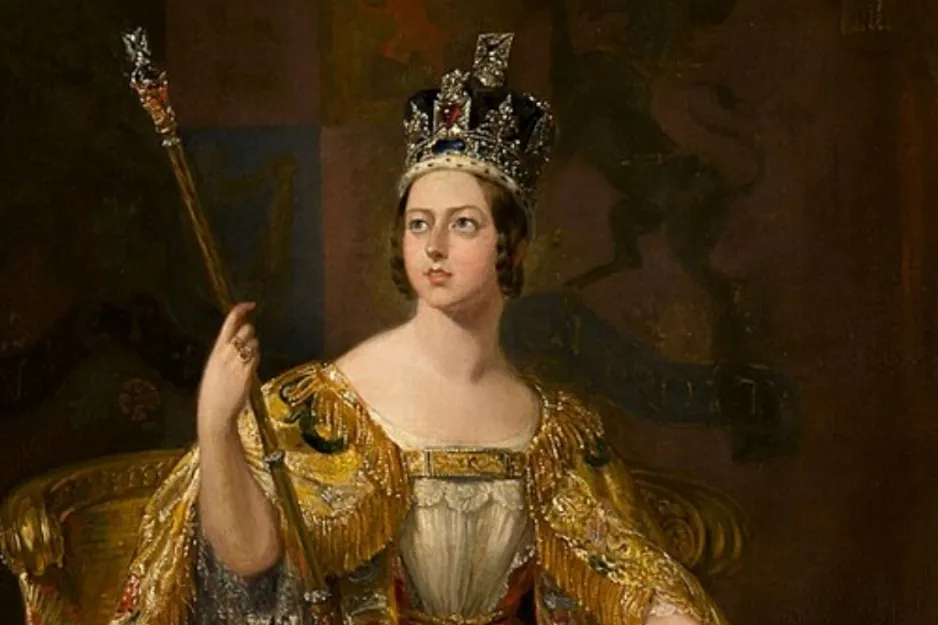 Portrait of Queen Victoria wearing a jeweled crown and golden robe, symbolizing the longest-reigning British monarch before Elizabeth II.